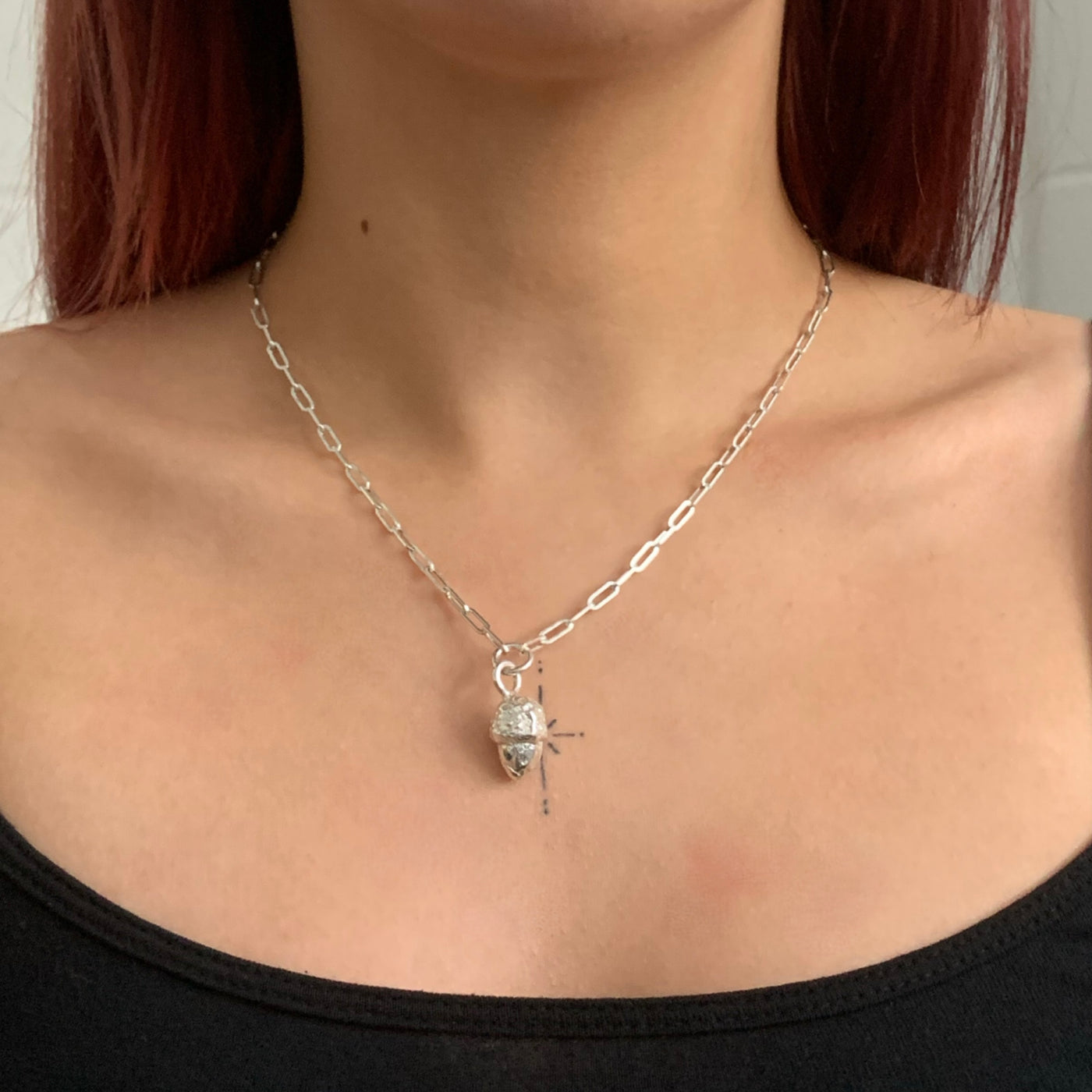 Handmade solid sterling silver acorn charm on a recycled silver trace chain necklace from SilverBoo Jewellery in Lincolnshire